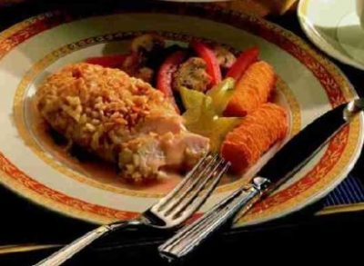 Amandelkip met sinaasappelsaus