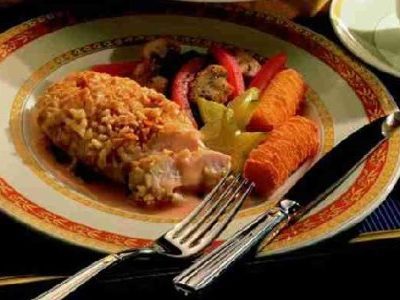 Amandelkip met sinaasappelsaus