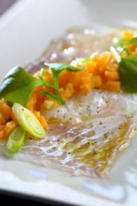 Carpaccio van schelvis met gekonfijte worteltjes