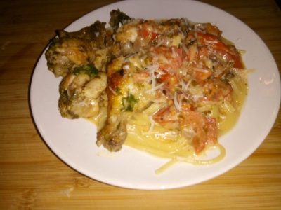 Kipvleugels in balsamicoazijn met spaghetti