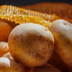 Aardappelen met ham in schelpen